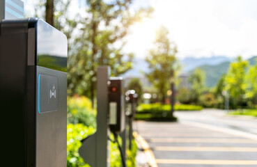 Electric car charging station by the road