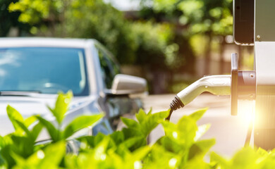 Electric car charging station by the road