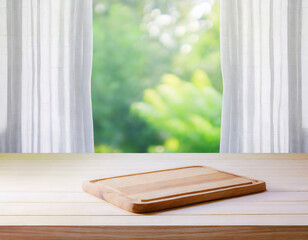 Selective focus.Wood table top and chopping board on blur curtain window with fresh garden in morning background.For montage product display or design key visual