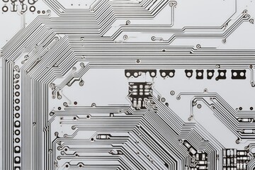 Texture of a printed circuit board with a white background. Background related to computer technology and information technology.