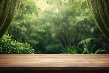 The background features a blurred curtain and a window view of a lush green garden with trees. The wooden table top is empty, intended for use in product displays or design key visuals.