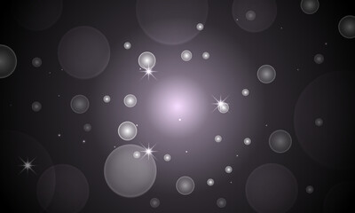 blurry bokeh circles against dark background.