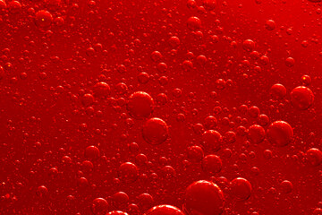 Water bubble texture on red background