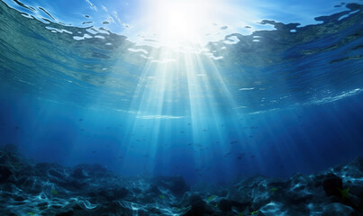 Fototapeta na wymiar Underwater scene with sunbeams shining through the water surface. High quality photo