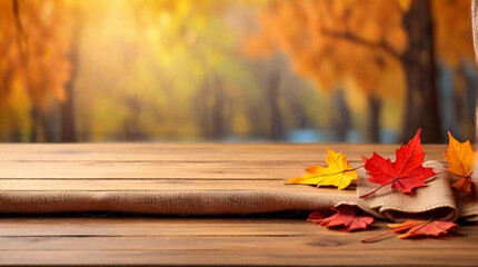 Naklejka na ściany i meble autumn leaves on a wooden table