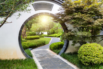 Circle door of Chinese style courtyard - obrazy, fototapety, plakaty