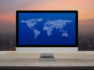 2024 start up business icon with global words world map on computer screen on table over blur of cityscape, Happy new year 2024 start up online, Elements of this image furnished by NASA