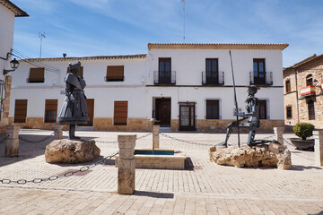 statues of don quixote and dulcinea in the town of el toboso - obrazy, fototapety, plakaty