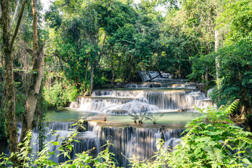 Fototapeta na wymiar Beautiful Jungle waterfall in tropical rainforest in Thailand.