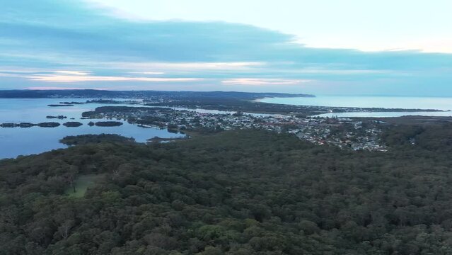 Wide aerial panorama over Lake Macquarie in Australia Murrays beach 4k.

