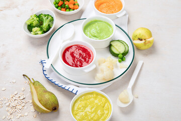 Baby food. Colorful vegetable and fruit puree.