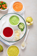 Baby food. Colorful vegetable and fruit puree.