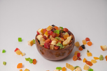 Mixed dry fruits on white bowl with white background, Mixed dried fruits on glass bowl with white background
