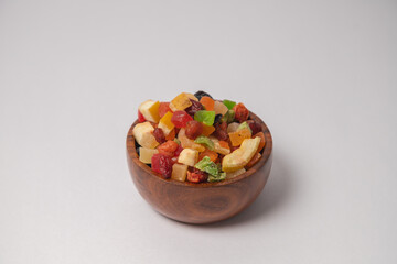 Mixed dry fruits on white bowl with white background, Mixed dried fruits on glass bowl with white background