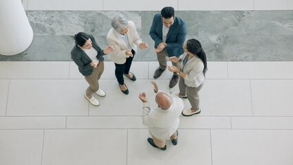 Business people, success and clapping above for teamwork, group support and collaboration, thank you or celebration. Circle of men and women applause for team building, achievement or project goals