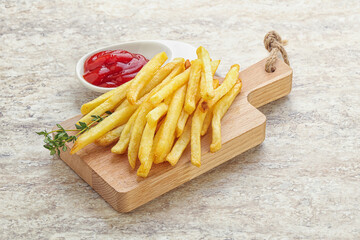 French fried potato over board