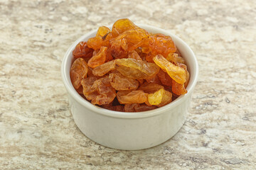 Sweet yellow raisin in the bowl