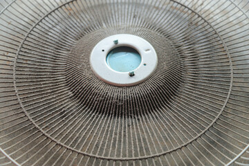 Dirty dust stain on metal fan cover from long using in daily life for cleaning concept idea. for...