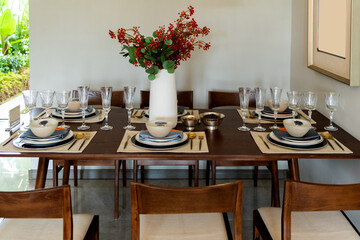 Dinner table with plates and glasses