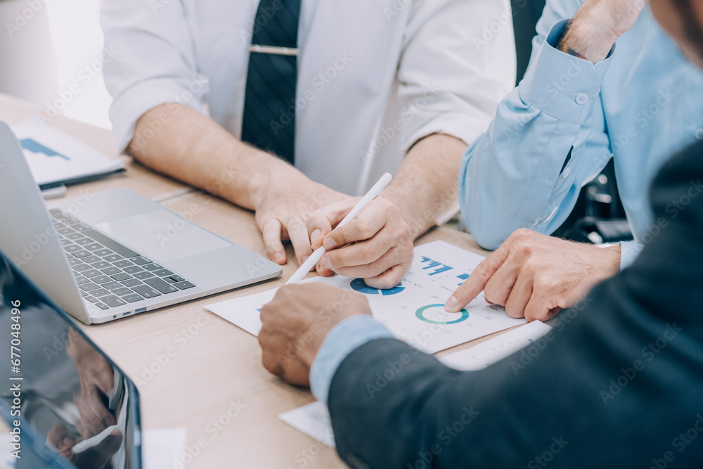 Wall mural Entrepreneurs and business people conference in modern meeting room, happy multiracial coworkers have fun cooperating working together at office meeting, asian teamwork concept