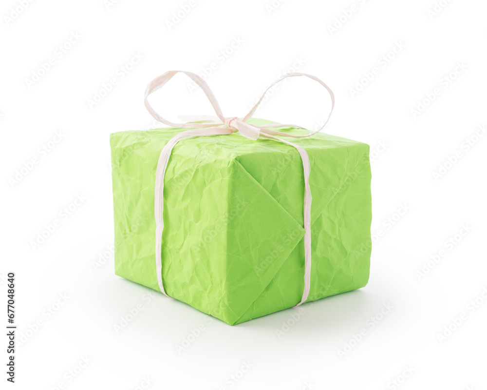 Wall mural crumpled paper bright green color present box with white recycled paper ribbon isolated on white