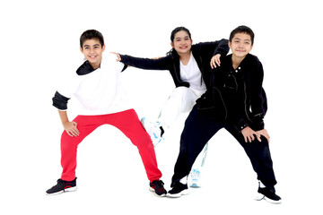 Happy student kid group studying modern style dance in indoor studio classroom, children, boys and girl, dancing on white background. Three little dancers practicing break dance together.