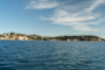 Fototapeta na wymiar Blurred photo of Villefranche SUr Mer in spring on a warm sunny day