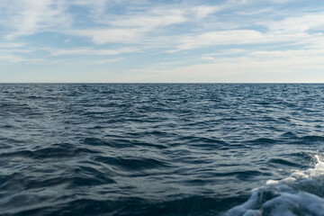 Fototapeta premium Sea travelling background of empty horizon with sunny weather