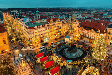 Aerial view of the famous Christmas market on the Old Town Square in Prague. - obrazy, fototapety, plakaty