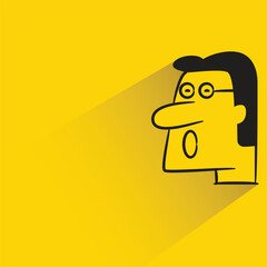 amazed man with shadow on yellow background