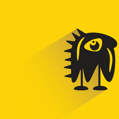 monster with shadow on yellow background