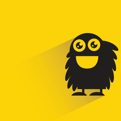 monster with shadow on yellow background