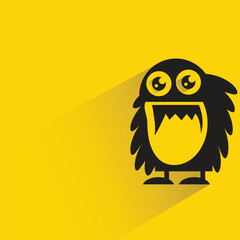 monster with shadow on yellow background