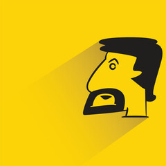 angry man with shadow on yellow background