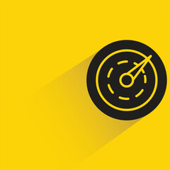 speedometer with shadow on yellow background