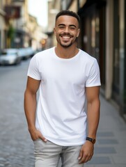 Fototapeta premium a man in white tshirt smiling and looking at the camera for Mockup tshirt
