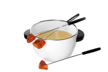 Oil in fondue pot and forks with fried meat pieces isolated on white