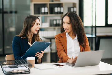 Portrait of success business people working together in office. Couple teamwork startup concept