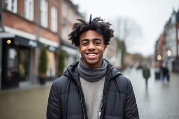 an europan africa black young man smile at camera in the city