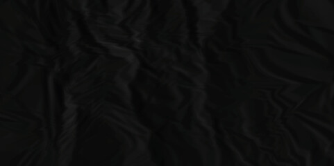 Dark black crumpled paper texture background. black crumpled and top view textures can be used for background of text or any contents.	