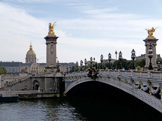 Fototapeta na wymiar The Pont Alexandre III, a deck arch bridge that spans the Seine in Paris