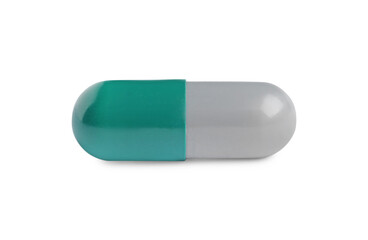 One pill on white background. Medicinal treatment
