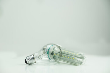 LED bulb next to tungsten bulb