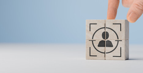 Wooden cube blocks with customer and target icon. Target customer, customer centric, customer...