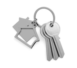 Keys with keychain in shape of house isolated on white, top view