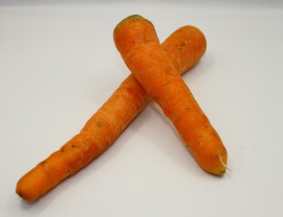Carrot on a white background, isolated, closeup of photo