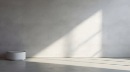 Minimal abstract light gray background for product presentation. Shadow and light from windows on plaster wall.