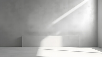 Minimal abstract light gray background for product presentation. Shadow and light from windows on plaster wall.