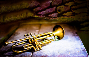 a splendid Antique Jazz trumpet in an old cellar