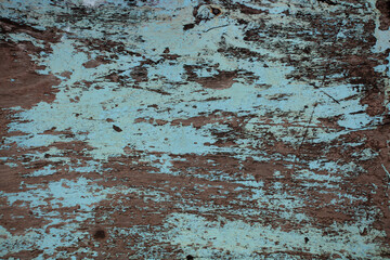 Old wooden walls with cracked and peeling paint